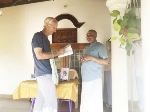 4. The editor, David Godman, signing and discussing the content of Silent Presence, Vol.1 with an enthusiastic and grateful reader.