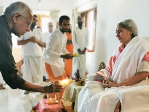 1. The conclusion of Guru Purnima celebrations. Here a coconut with lit camphor is waved around Amma in order to remove any ill effects from any 'evil eyes' that may have fallen on Amma. Although none of that can touch Amma, we do it for our satisfaction.