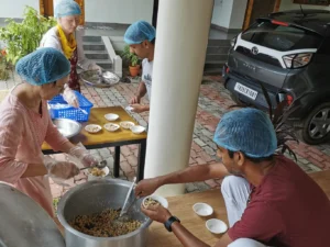 2. Preparing the prasad offered to satsang members on the occasion of Ganesh Chaturthi.